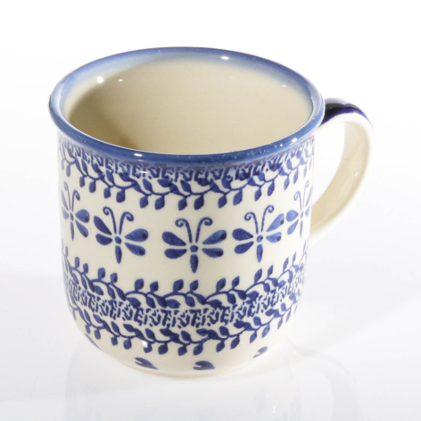 Blue and white ceramic mug with geometric and floral hand-painted patterns, front view