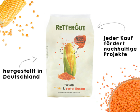 Brettergut Kartonverpackung mit gelber und oranger Illustration, nachhaltigem Siegel