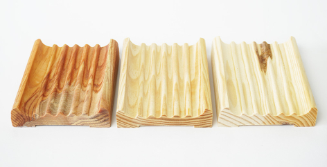 Three handwoven cream and golden-brown striped textile samples displaying natural fiber weaving variations