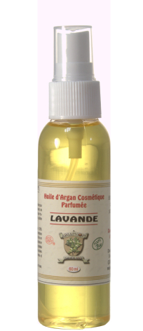 Golden-yellow lemongrass body oil in clear glass bottle with white spray pump, front view against white background