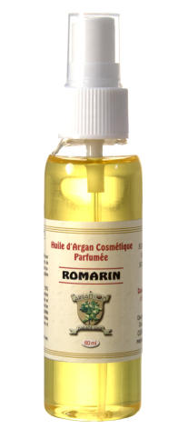 Golden yellow hair oil in clear spray bottle with white pump nozzle and beige label, front view