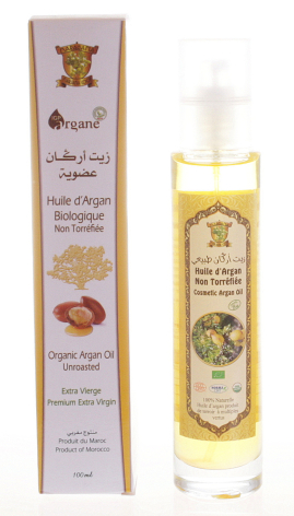 Golden argan oil in clear glass bottle with beige and burgundy labeled packaging box, front view