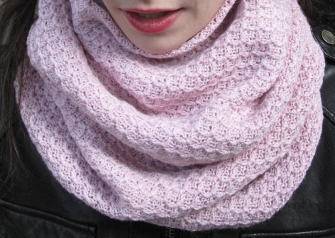 Lavender knit cowl neck scarf with textured weave, worn around shoulders in close-up view