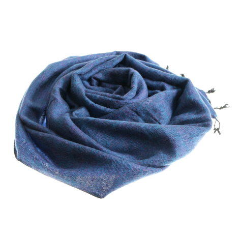 Deep blue linen scarf with soft gathered folds and decorative corner tassels, displayed flat from above