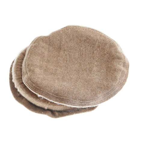 Beige round fabric coasters stacked together, showing layered textile with subtle texture detail