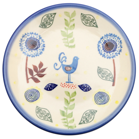 Circular cream textile with blue border, embroidered botanical and folk art motifs in blue, burgundy, and green