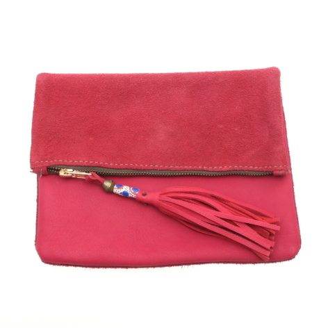 Red suede leather fold-over clutch with decorative tassel detail, front view