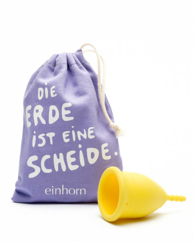 Purple drawstring pouch with white text next to a yellow cylindrical object, front view