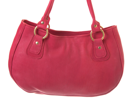 Magenta leather tote bag with dual handles and curved silhouette, front view