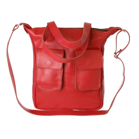Red leather backpack with front pockets and adjustable shoulder straps, front view