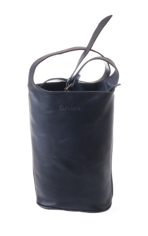 Dark navy leather cylindrical pouch with drawstring closure and metal straw detail, front view