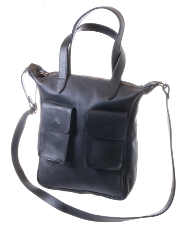 Black leather tote bag with dual handles and front pocket, shown from front view at slight angle
