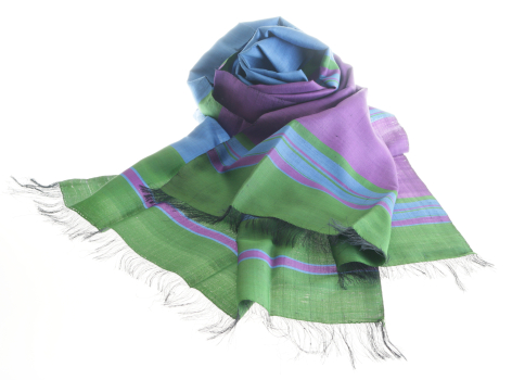 Lightweight cotton scarf in blue, green and purple with hand-dyed colour blocking and fringed edges, displayed draped
