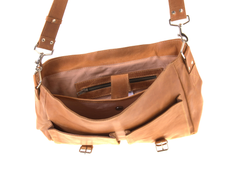 Tan leather shoulder bag with front flap closure and brown adjustable strap, shown open to reveal interior compartment