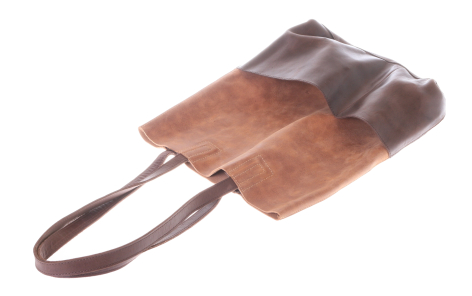 Brown leather tote bag with two handles, front view angled to show structured rectangular shape and rich patina finish