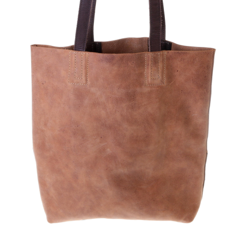 Tan leather tote bag with dark brown handles, front view showing distressed suede texture
