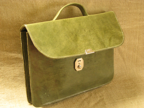 Olive green leather briefcase with flap closure and brass clasp, viewed from front angle