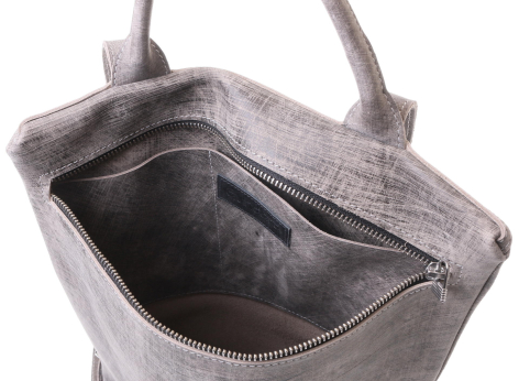 Gray woven tote bag shown open from above, revealing dark interior compartment and dual handles