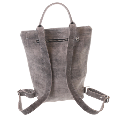 Grey suede convertible backpack displayed from rear view, showing dual shoulder straps and structured silhouette
