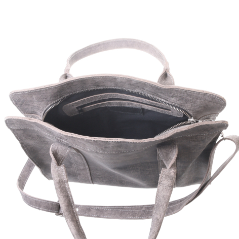 Grey leather tote bag open to show black interior, with dual handles and structured silhouette