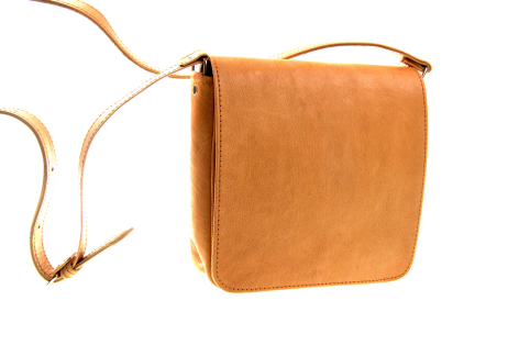 Tan leather crossbody bag with front flap closure and adjustable shoulder strap, shown from front angle