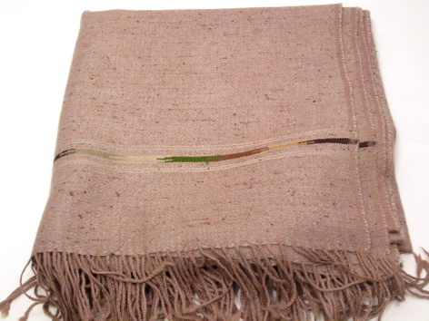 Taupe linen throw with decorative slits and knotted fringe trim, folded flat view