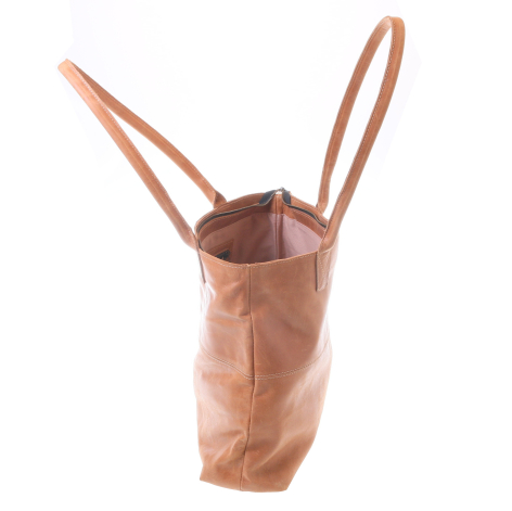 Tan leather bucket bag with dual handles, viewed from above showing open top and structured cylindrical shape