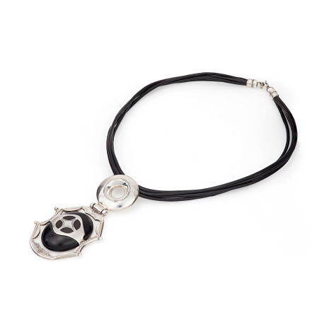 Black cord bracelet with silver-toned spherical pendant featuring openwork cutout design, front view