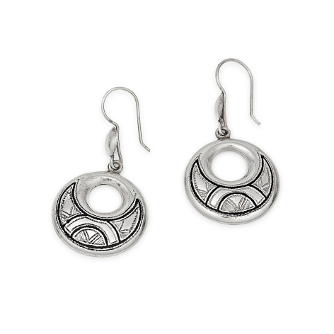 Pair of silver drop earrings with circular domed pendants featuring intricate geometric line patterns throughout