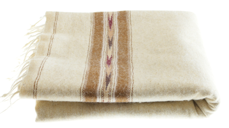 Cream linen textile with brown stripe detail and fringe edges, folded flat view