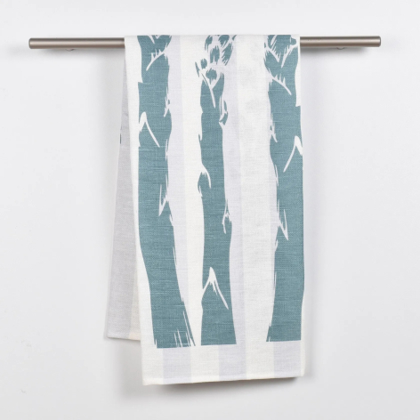 Teal and cream striped cotton throw draped over a metal rod, displaying abstract vertical pattern detail