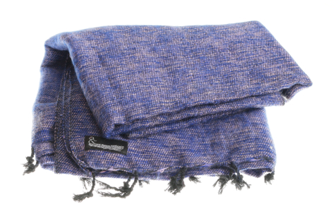 Indigo blue handwoven textile with frayed edges, folded and layered in front view