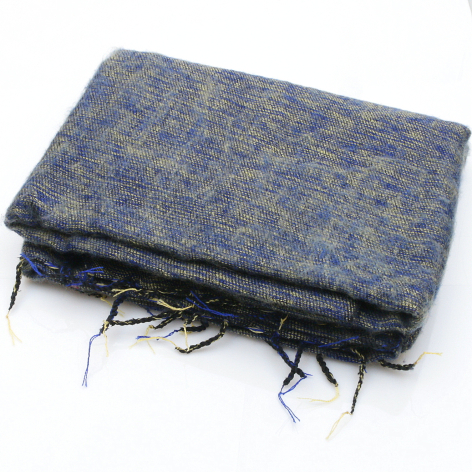 Blue and grey woven textile with fringed edges, folded flat in front view showing handcrafted weave pattern