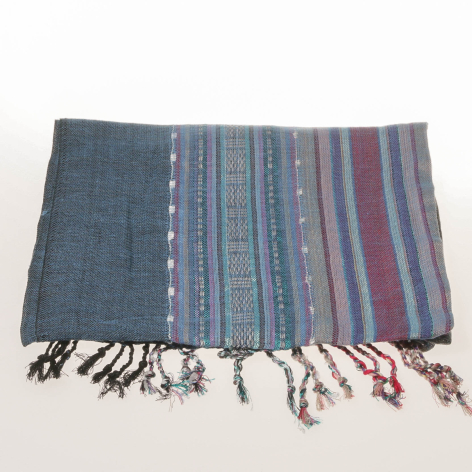 Blue and burgundy striped cotton textile with decorative woven patterns and knotted fringe ends, laid flat