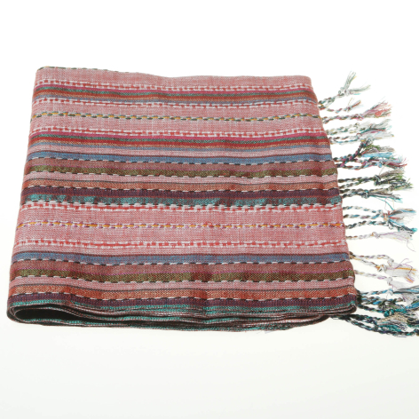 Red and grey striped woven textile with geometric patterns and fringed edges, folded flat view