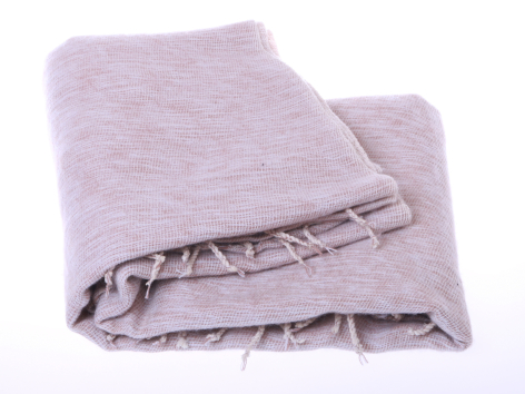 Folded lavender linen textile with raw edge detail, front view