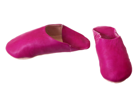Bright fuchsia leather slippers shown from top and side views, with soft curved silhouette and tan suede interior lining