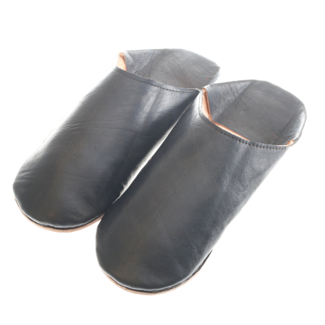 Gray leather slippers with tan trim, top view showing soft cylindrical form and drawstring closures