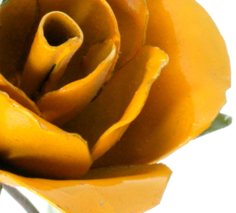 Golden yellow leather rose with layered petals, front view detail shot showing dimensional folding and craftsmanship