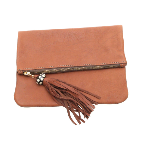 Terracotta leather clutch bag with front tassel detail and adjustable strap, front view