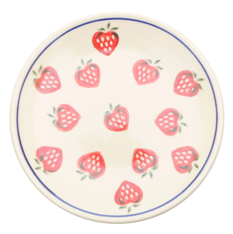Round ceramic plate with cream background featuring scattered red strawberry illustrations, gray rim