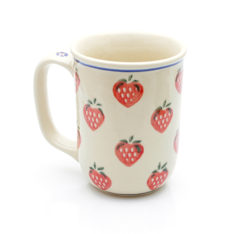 Cream ceramic pitcher with red strawberry pattern and blue stripe rim, front view