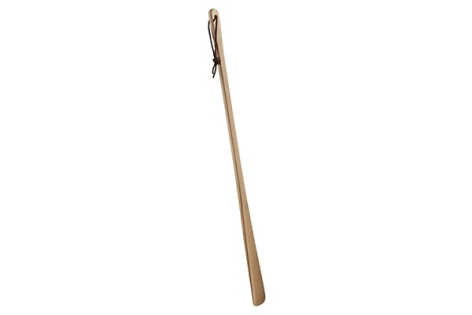 Wooden stick with natural grain and tied twine at top, angled diagonally against white background