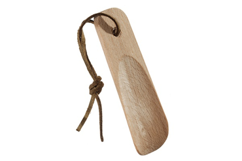 Beige linen bookmark with knotted leather cord attachment, displayed at slight angle against white background