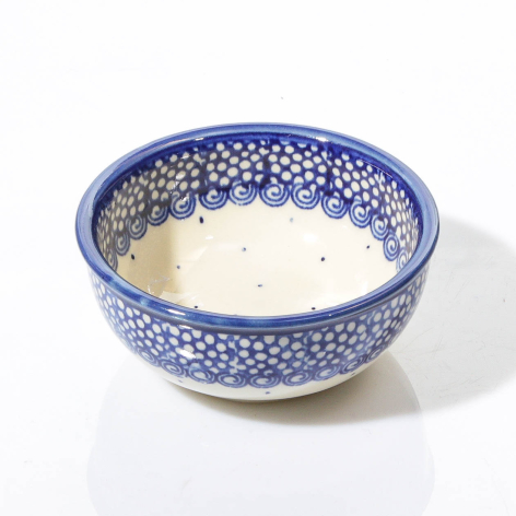 Blue ceramic bowl with white speckled pattern, cream interior, handcrafted from Central Asia
